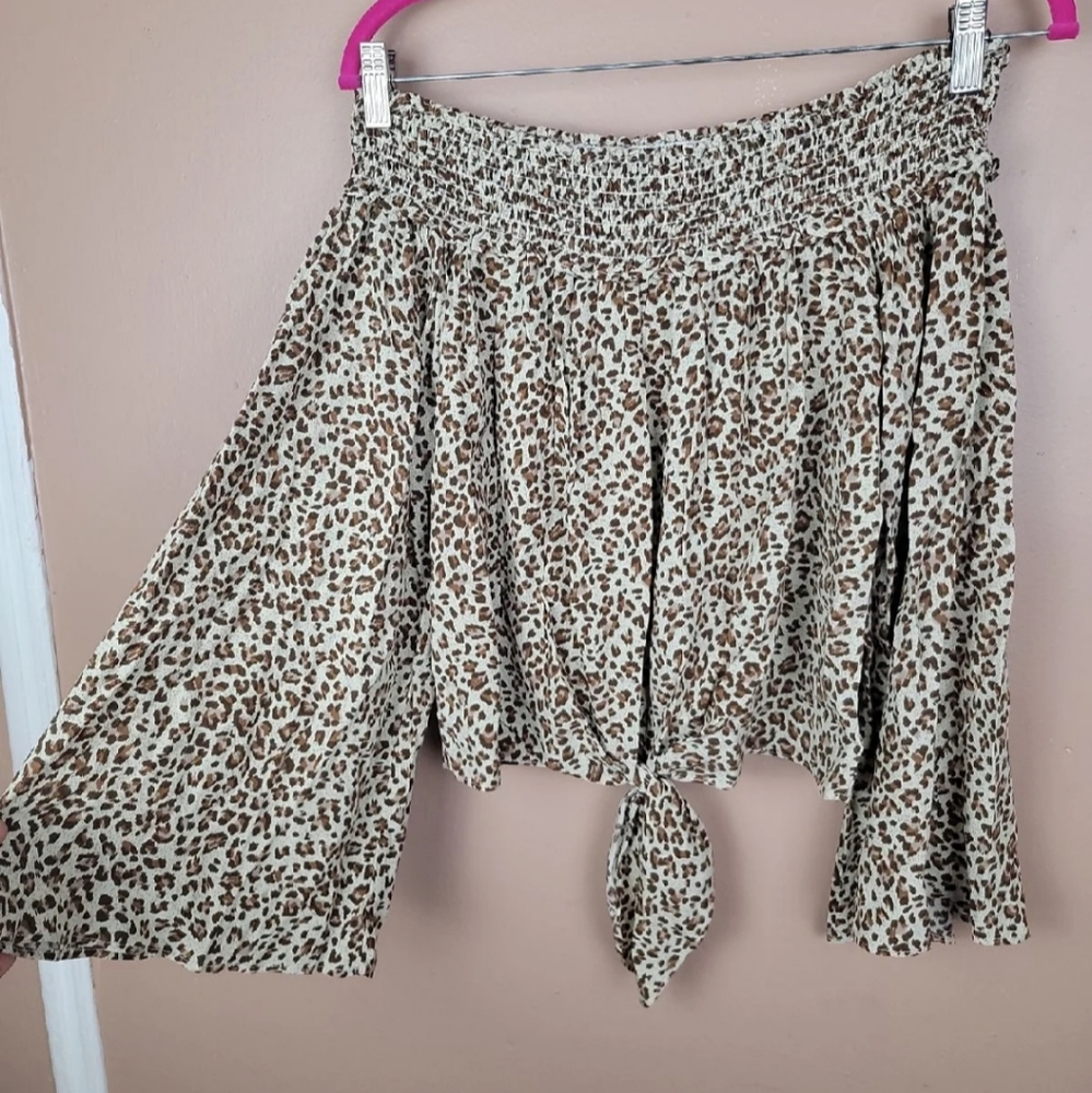 Free people movement brown cheetah print off Shoulder blouse